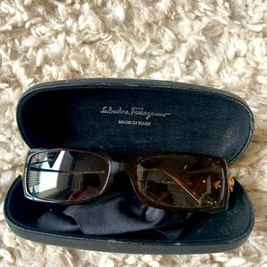 Salvatore Ferragamo sunglasses with gem embellishment on the arm. Very stylish!